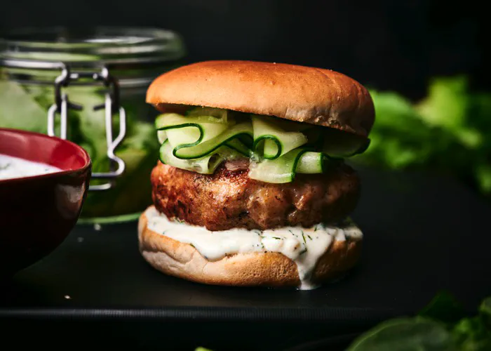 Elevate your burger game with these juicy and protein-packed Turkey Burgers with Cucumber Relish.