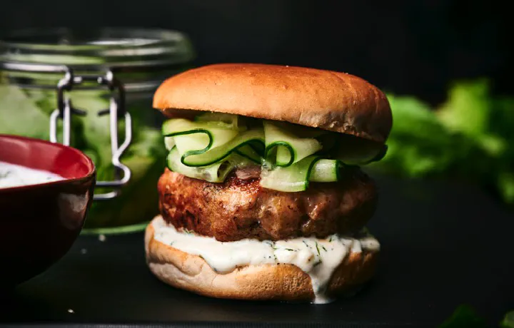 Elevate your burger game with these juicy and protein-packed Turkey Burgers with Cucumber Relish.